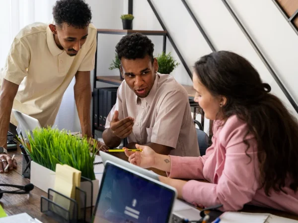 What challenges face website designers building large corporate platforms?